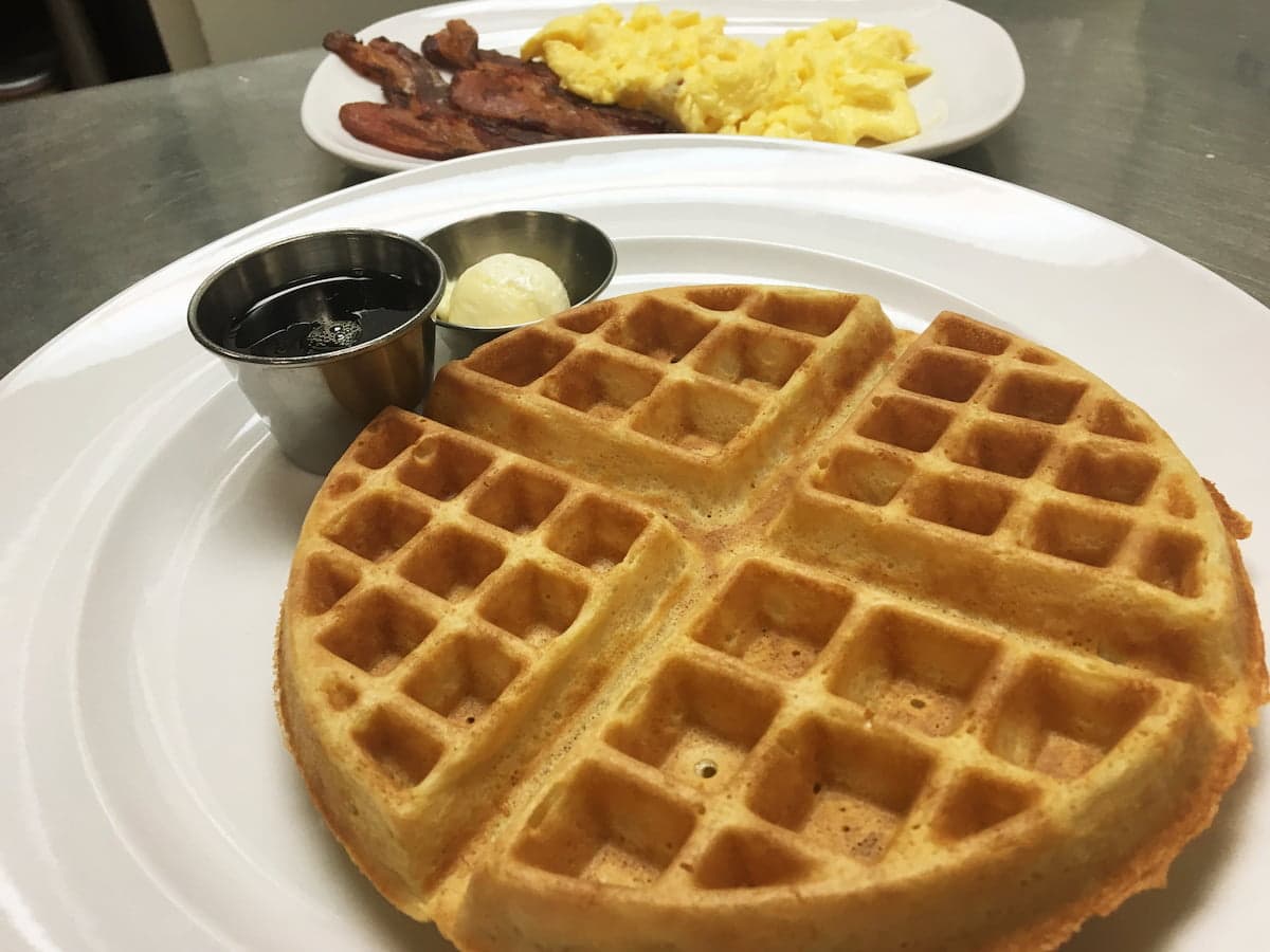 Belgian waffle breakfast plate at Bailey’s Breakfast & Lunch in Omaha