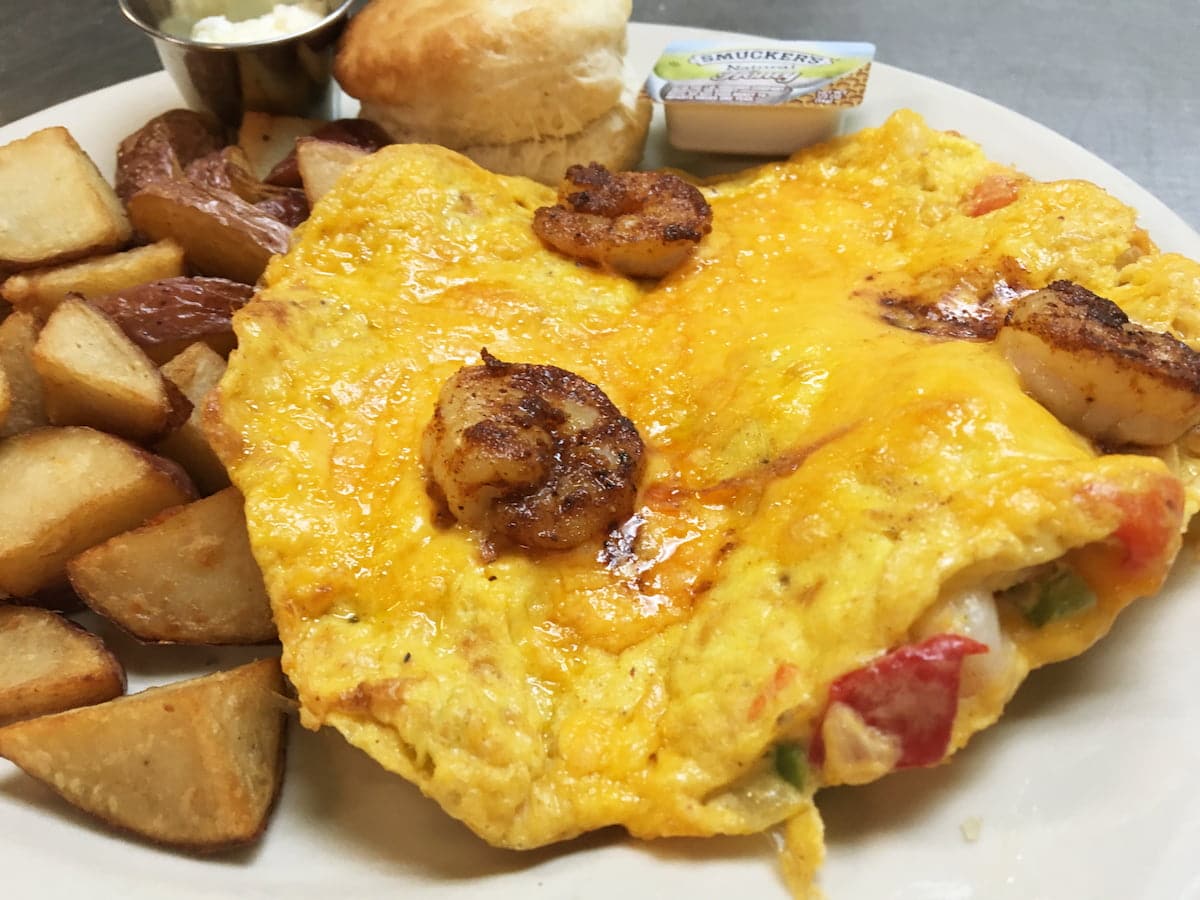 Louisiana omelet breakfast plate with shrimp and andouille sausage at Bailey’s Breakfast & Lunch in Omaha