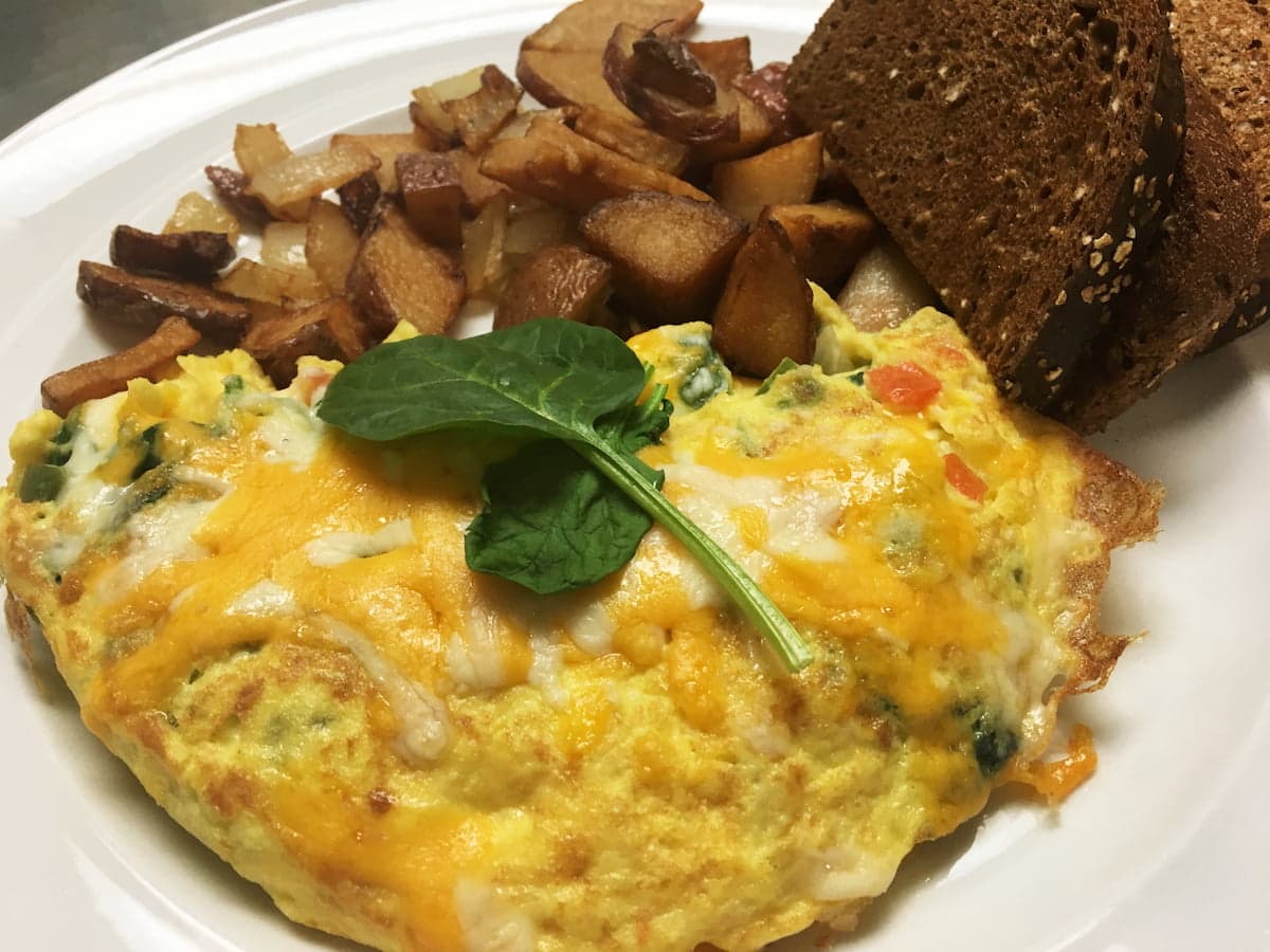 Veggie omelet breakfast plate at Bailey’s Breakfast & Lunch in Omaha