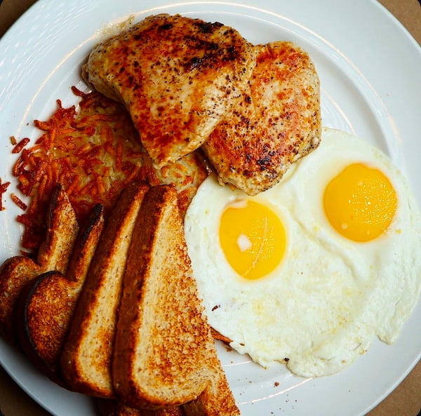 Porkchop breakfast with eggs and hash browns at Bailey’s Breakfast & Lunch in Omaha