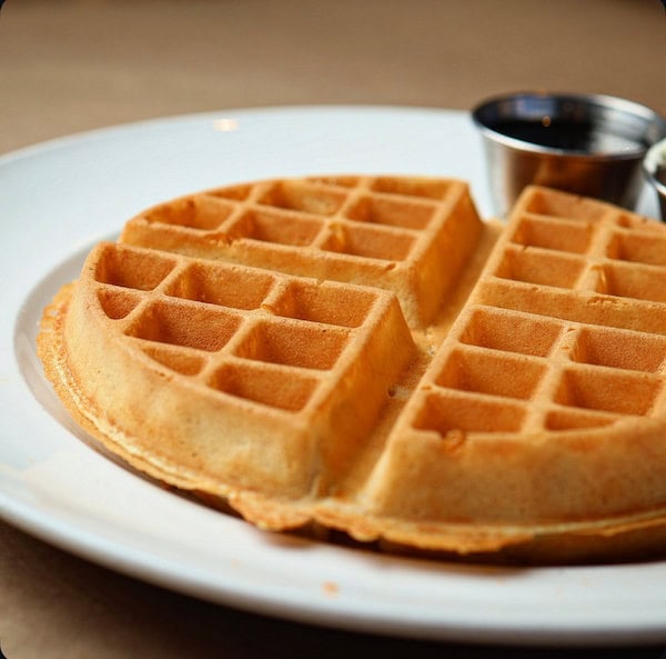 Belgian waffle breakfast plate at Bailey’s Breakfast & Lunch in Omaha
