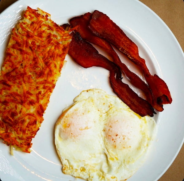 The Classic breakfast plate with eggs and bacon at Bailey’s Breakfast & Lunch in Omaha